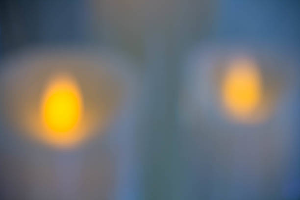 istock blurred electric candles on the background 545282468
