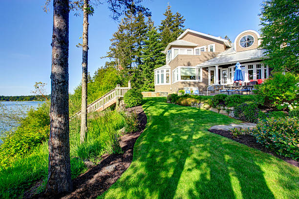istock Luxury house exterior with impressive backyard landscape design. 545283170