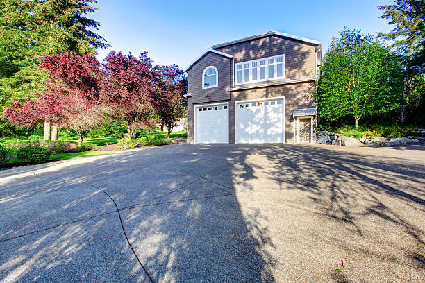 istock Luxury gray house with white trim and two garage spaces. 545283984