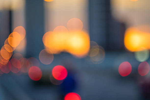 istock Blurred light of street with sunset bokeh background 545284466