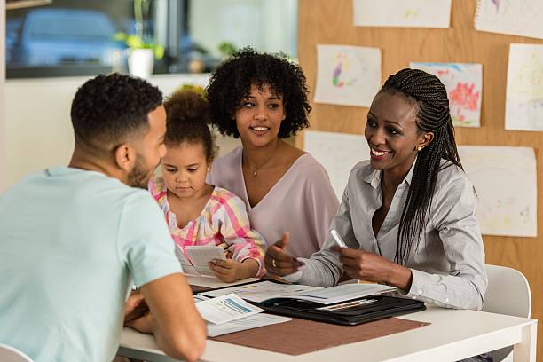 istock Financial advisor discussing with couple 545285022