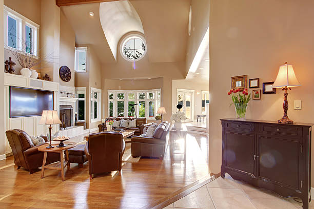 istock Large living room interior design with high vaulted ceiling 545285928