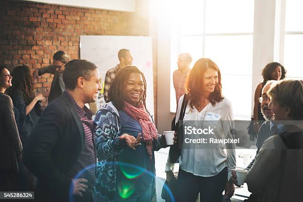 Business Team Meeting Working Talking Concept Stock Photo - Download Image Now - Laughing, Working, Multiracial Group