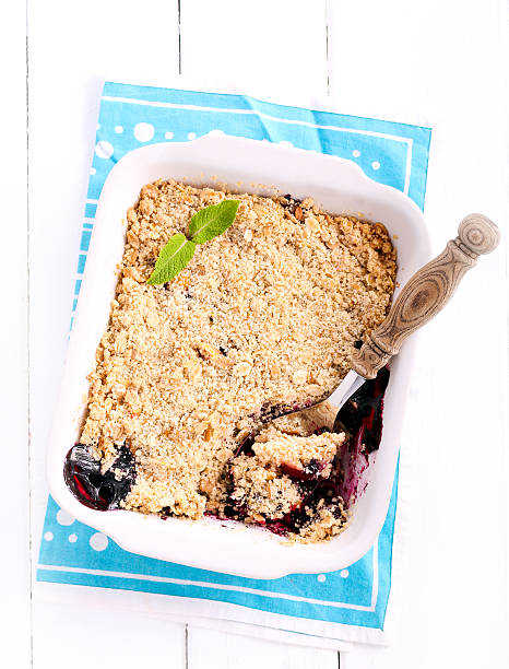 istock Blackberry and apple crumble cake in a tin 545335150
