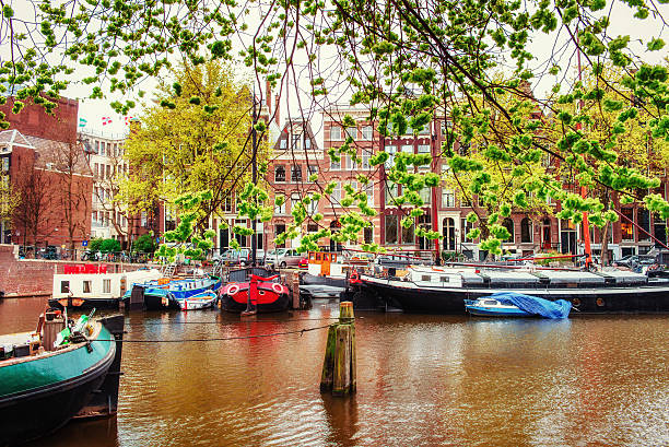 istock Amsterdam canals and typical houses. 545335590