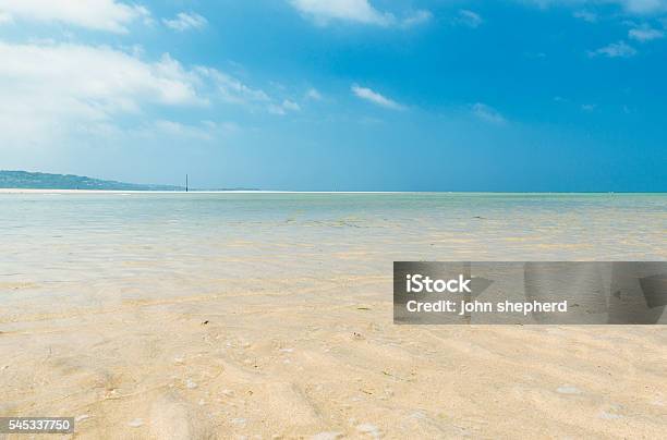 Hayle Beach Views To St Ives Fish In The Water Stock Photo - Download Image Now - Beach, Blue, Clear Sky
