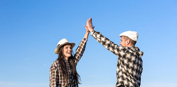 istock Man and Woman Clapping Hands Each Other 545339006