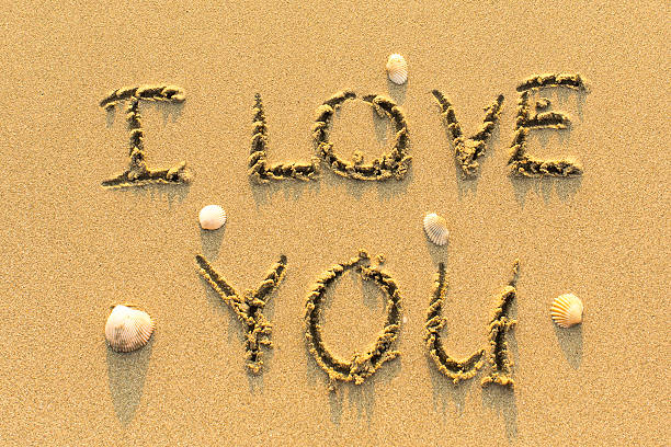 istock I Love You - drawn by hand on a beach. 545340754