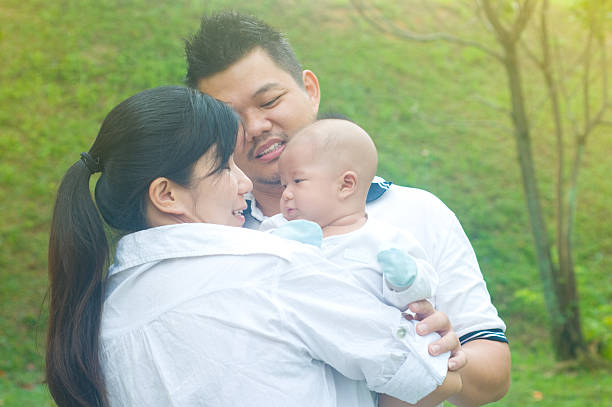 istock happy asian family 545343610