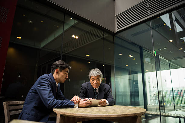 istock Reviewing the business stats on a tablet 545344186