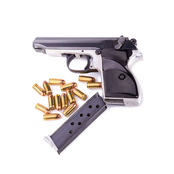 istock Guns and ammunition isolated on white background 545344330