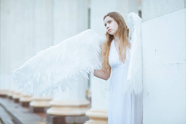 istock Girl with angel wings 545344668
