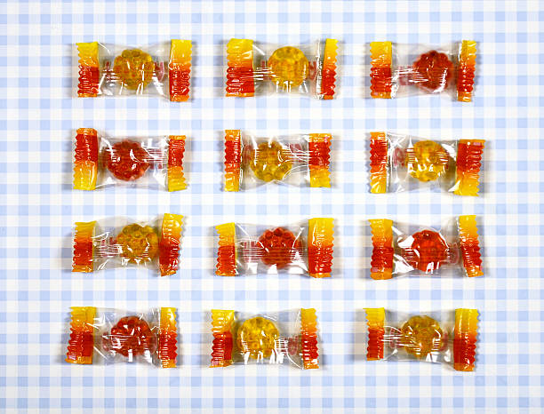 istock colorful Gummy Bear Candy  on checkered background 545345032