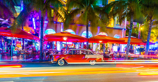 Miami South Beach Ocean Drive palms and beachfront colorful view, Florida state in United States of America