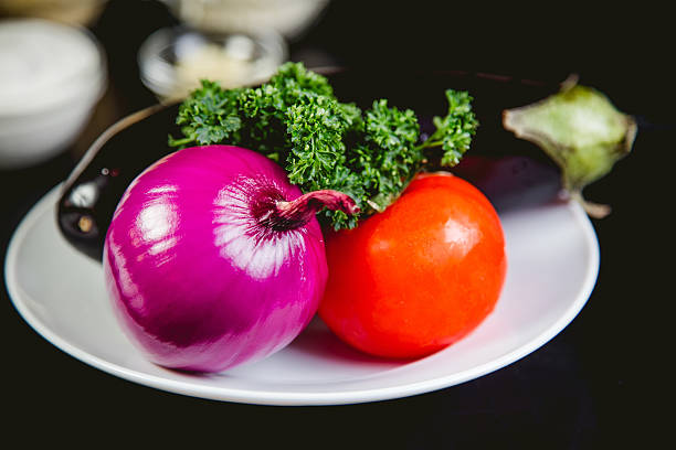 istock Vegetables on the table eggplant tomato and onion 545347188