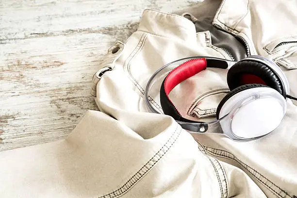 Photo of Headphones on a white Jacket