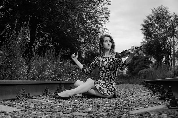 istock Beautiful girl with a violin 545347908