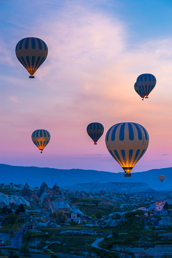 Hot air balloons rising at Cappadocia - Turkey in the morning.