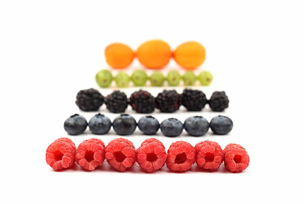 istock different types of berries lie in rows on white background 545352126