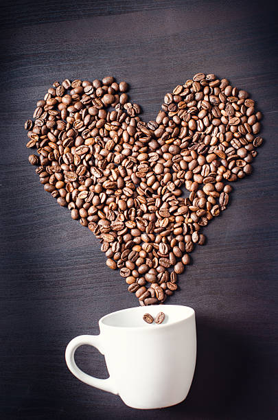 istock Heart consist from coffee beans. Coffee roasted beans 545352758
