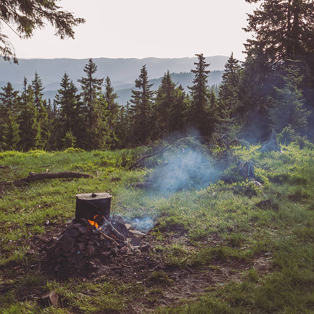 istock Cooking on campfire during hicking in mountains 545352958