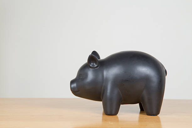istock Black chalk board piggy bank 545354260