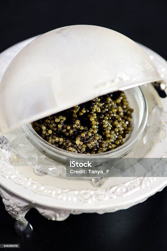 Black Caviar Black Caviar Served on Ice  Appetizer Stock Photo