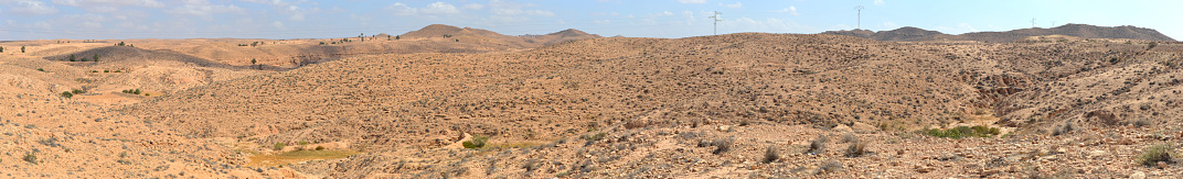 Horizontal view of desert with hills in Tunisia, North Africa.