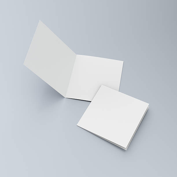 Square blank leaflets or brochures on blue three-wings square blank brochures isolated on light background unfolded stock pictures, royalty-free photos & images