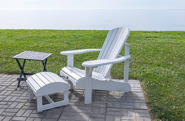istock White Adirondack Chair by Lake Erie 545359454