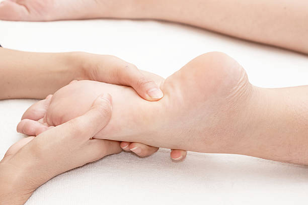 istock Reflexology foot massage in the day spa 545359678