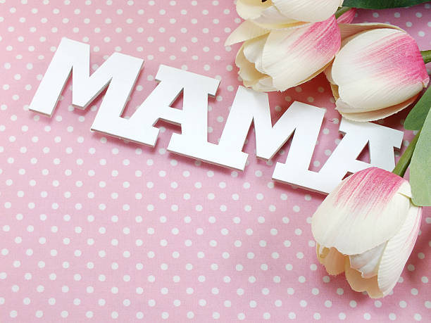 istock mother's day with beautiful artificial flowers pink polka dot 545360428