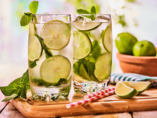 istock On wooden boards is glass with mohito and lime. 545360480