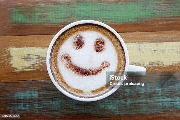 Smile Face Drawing On Latte Art Coffee Wood Color Background Stock Photo - Download Image Now