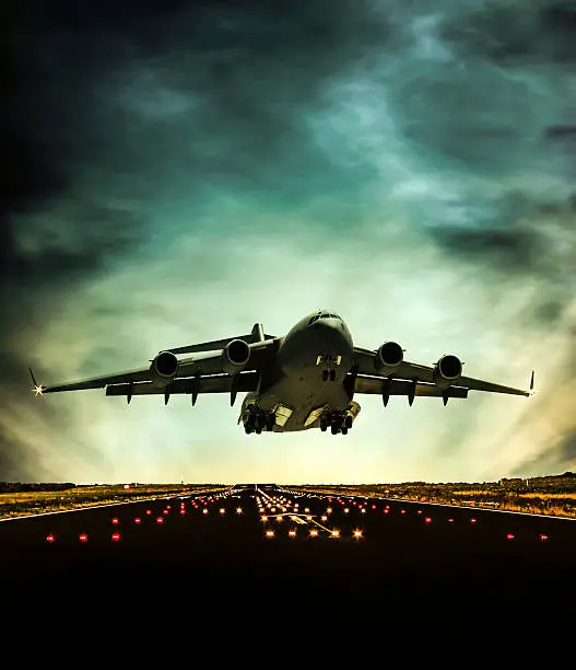 Photo of Cargo Airplane taking off at dusk