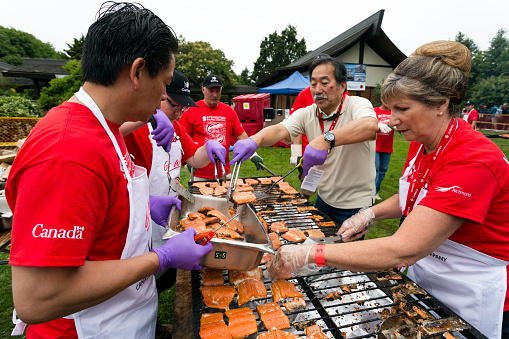 Richmond, British Columbia, Canada - July 1, 2016: The annual Steveston Salmon Festival celebrated on Canada Day in Steveston village located near Vancouver in Richmond, British Columbia, Canada. The people of Steveston have come together every year since 1945 to celebrate salmon, Canadaâs birthday and the rich heritage of their community.