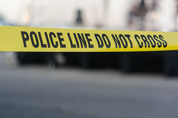 istock Yellow police line tape 545370470