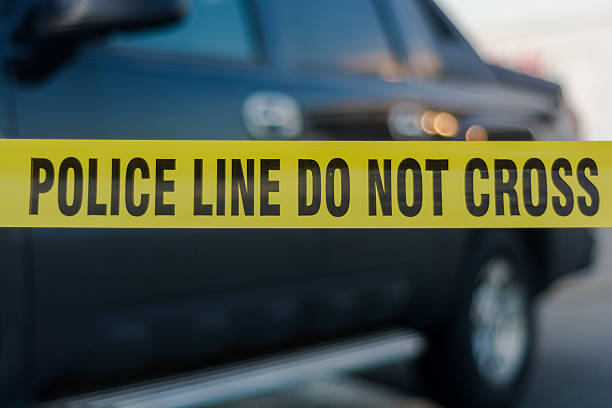 istock Yellow police line tape 545370480