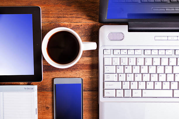 istock Technology: Laptop, smart phone, digital tablet on desk. Communications. 545372100