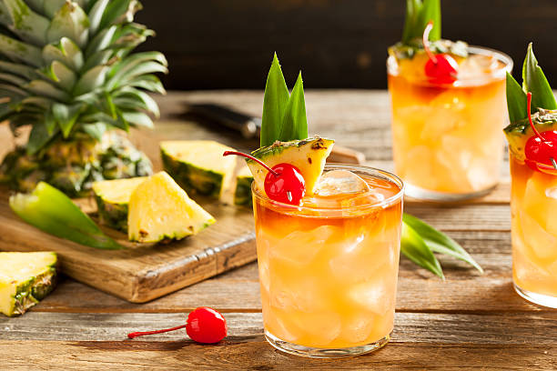homemade mai tai cocktail - fruit liqueur stock-fotos und bilder
