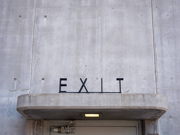 Close up of art deco exit sign above doorway at Hoover Dam. Taken June 2016.