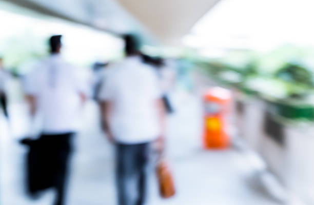 istock Abstract background of people on footbridge 545374320