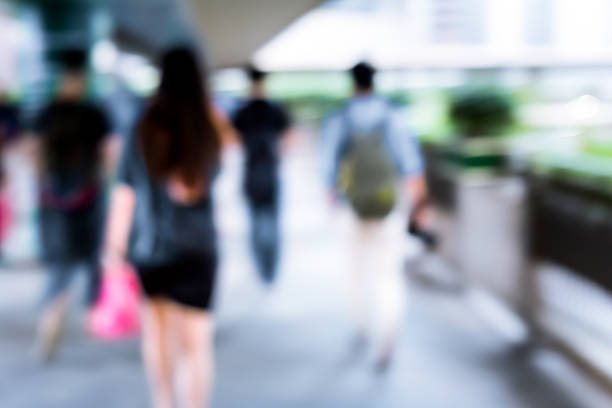 istock Abstract background of people on footbridge 545374422