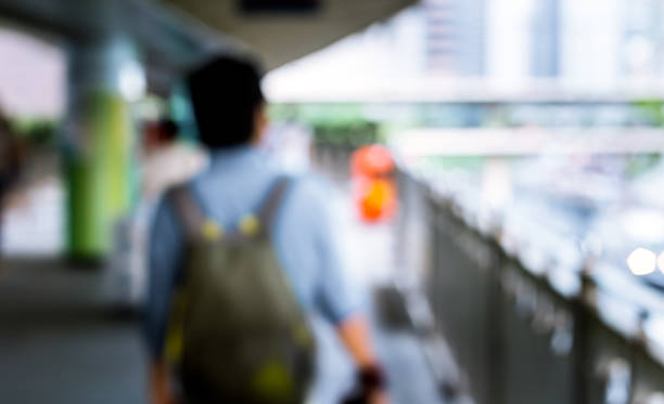 istock Abstract background of people on footbridge 545374440