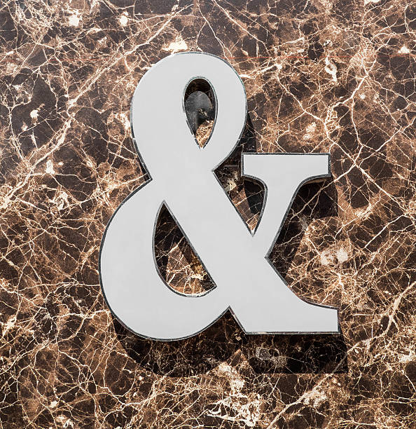 istock Ampersand (&) icon on dark color marble. 545374504