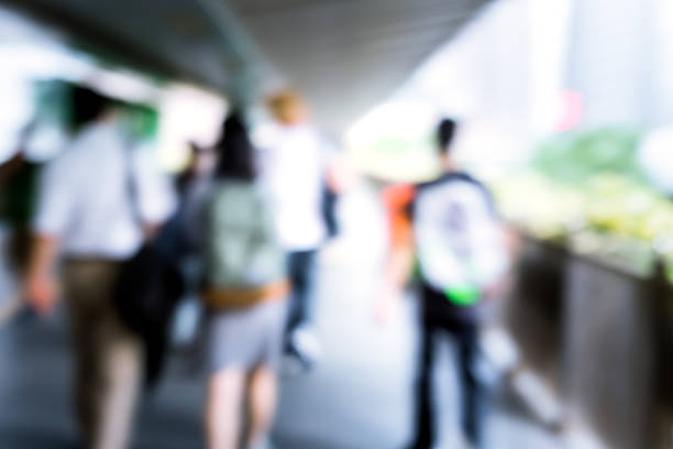 istock Abstract background of people on footbridge 545374514
