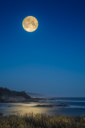 Harvest Moon over ocean