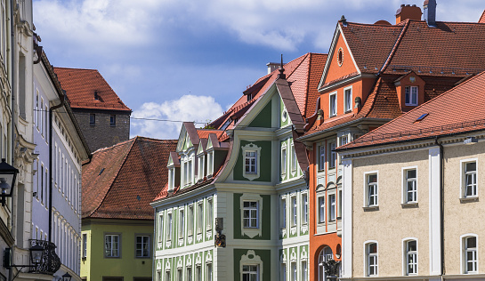 Detail of a selection of rooflines in regensburg, Germany shiwing a variety of bu8ilding styles.