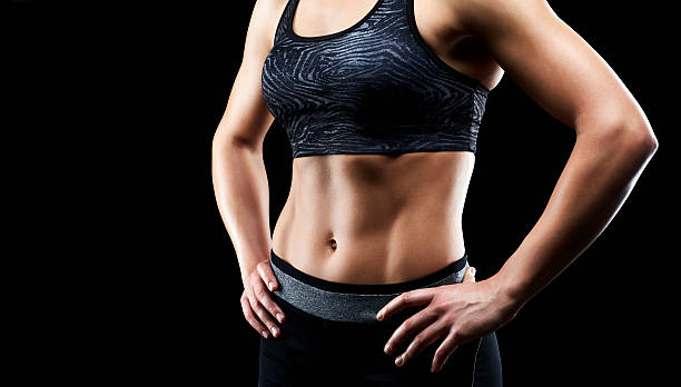 istock Fit woman's torso and abdomen muscles 545378188