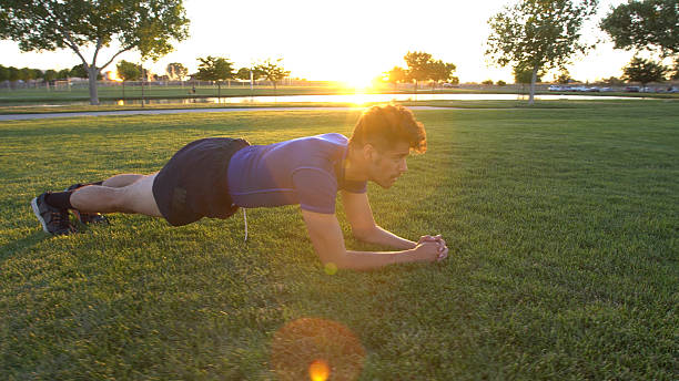 istock Young Athletic Man Exercising In A Park 545379230